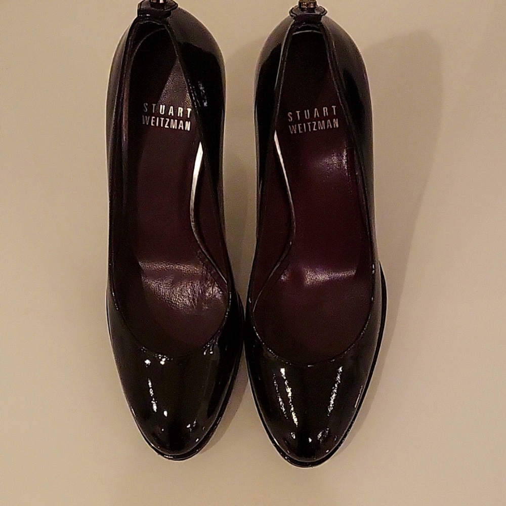 Stuart Weitzman black high heel pump.
